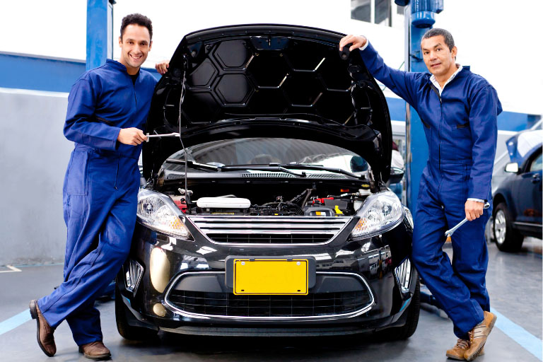 Two Expert Mechanics Ready to Provide Dent Repair Services