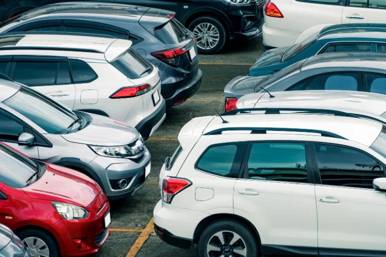 Close-Up of a Tight Parking Space and Garages