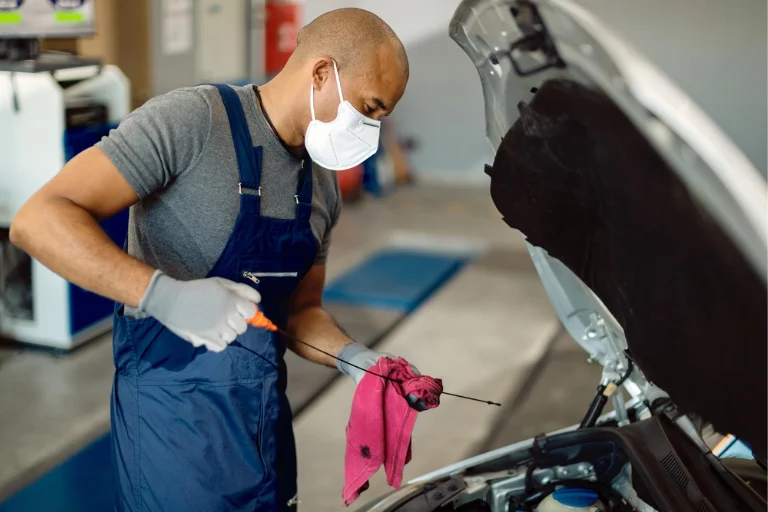 The Convenience of Mobile Oil Change in Dallas: Get Your Oil Changed at Your Doorstep 4 A Mechanic Checking the Fluids of a Car
