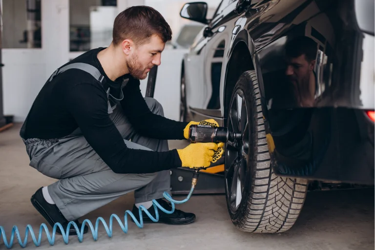Close-up of a Professional Technician Repairing a Damaged Rim