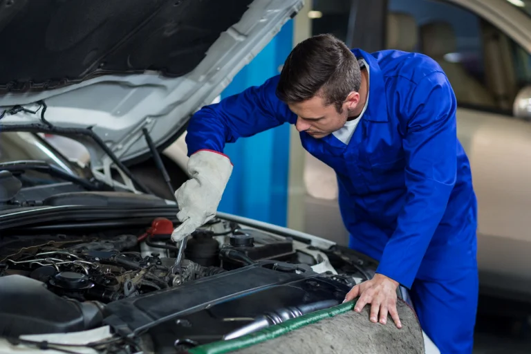A Mobile Mechanic Repairing a Car Radiator