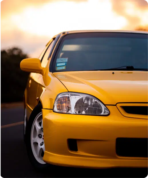 Sleek Yellow Car Ready for the Road.png