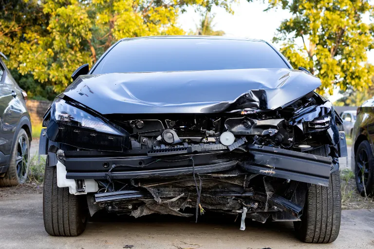 Scratches, Dents & Bodywork: Can a Mobile Mechanic Fix These in the USA? 4 A Close-Up of a Heavily Damaged Car Requiring Body Shop Repair