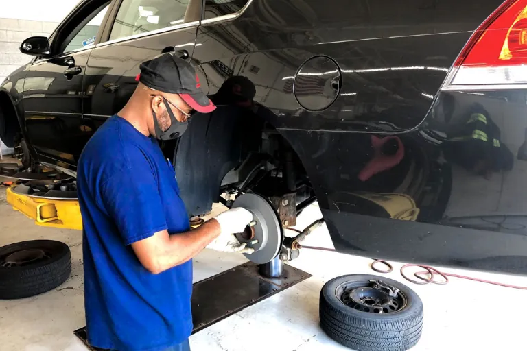 Fleet Maintenance Company Houston TX — What to Look For 3 A Technician Performing Maintenance in a Fleet Workshop