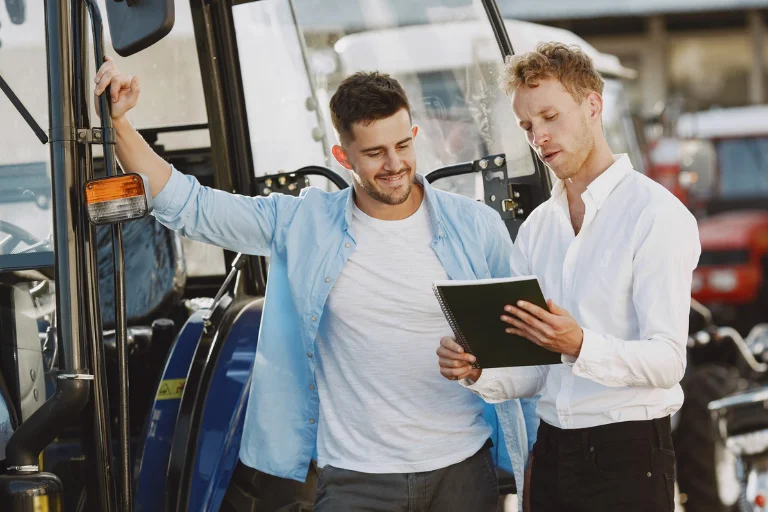A Close-up of Fleet Managers Reviewing Cost Reports