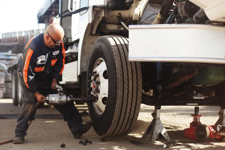 A Close-up of a Heavy-Duty Construction Truck Undergoing Inspection
