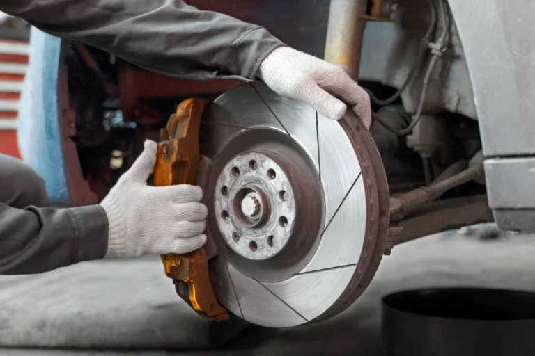 A Mechanic Inspecting Brake Components