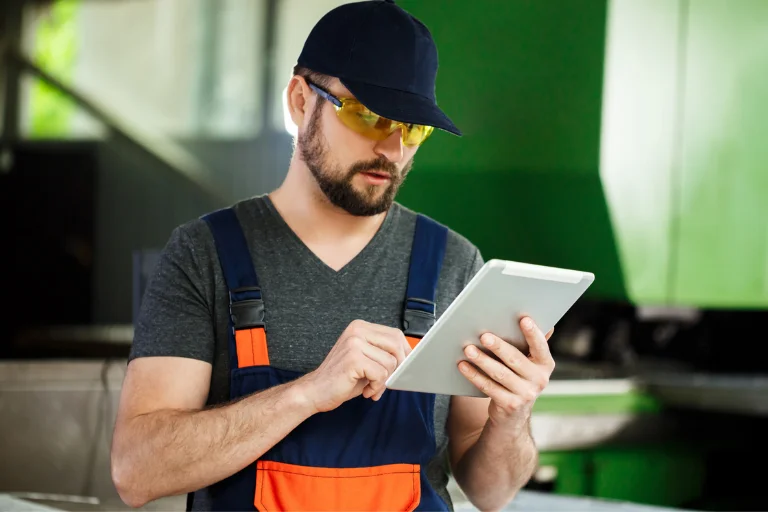 Technician Using a Digital Maintenance Checklist