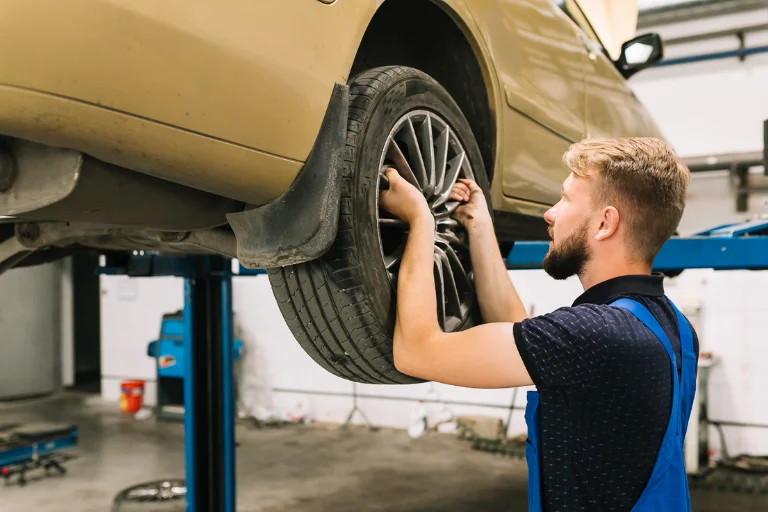 Commercial vehicle receiving repairs inside a professional repair shop