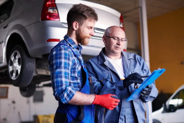 Fleet manager discussing maintenance options with a mobile mechanic